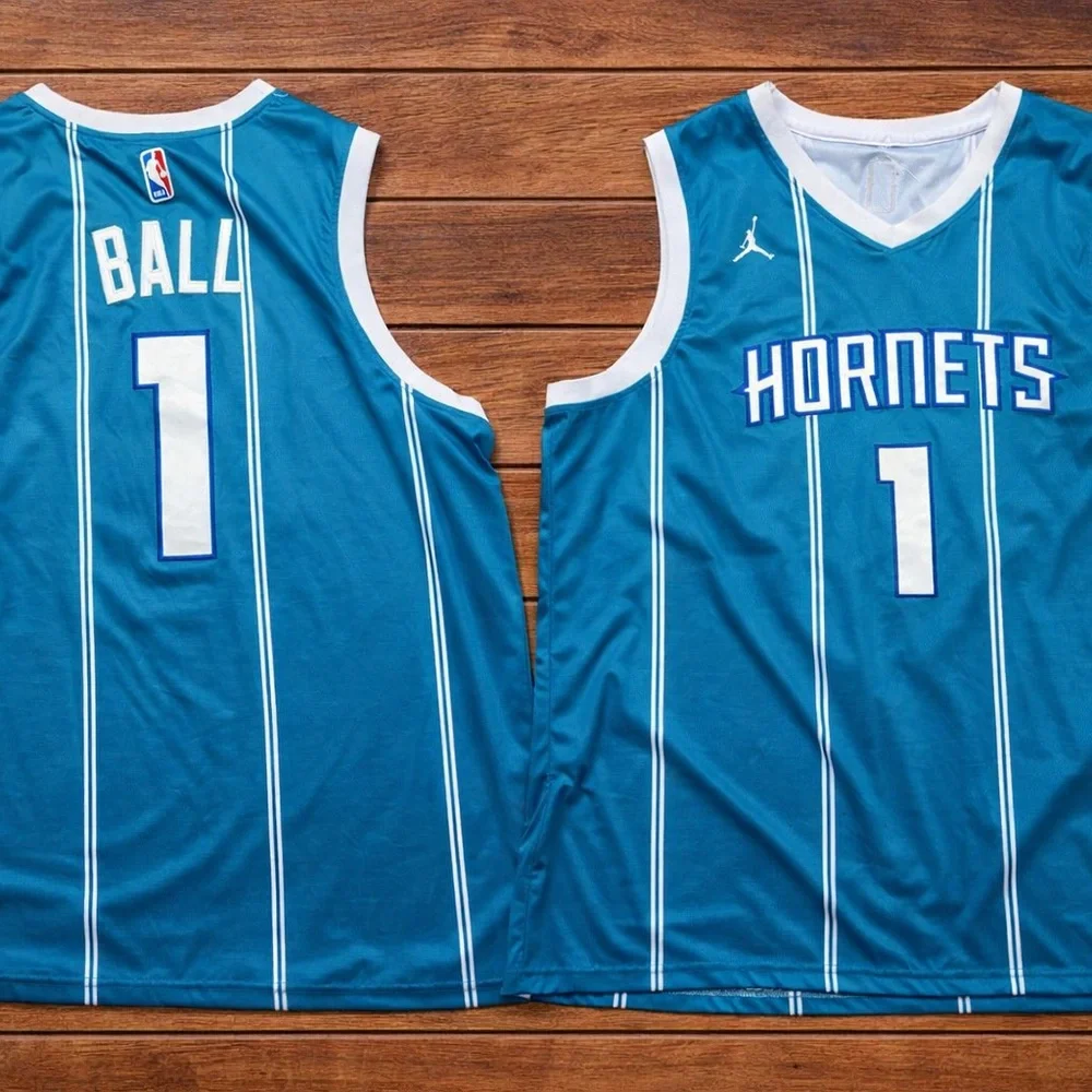 Jordan Teal Hornets Jersey with White Highlights - Picture 3 of 3
